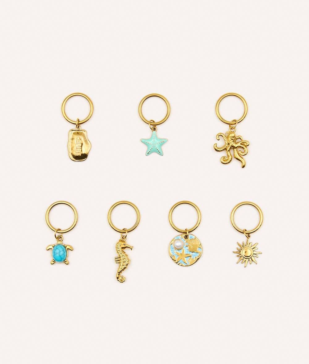 Pack de 7 breloques Perro Marino, Sira