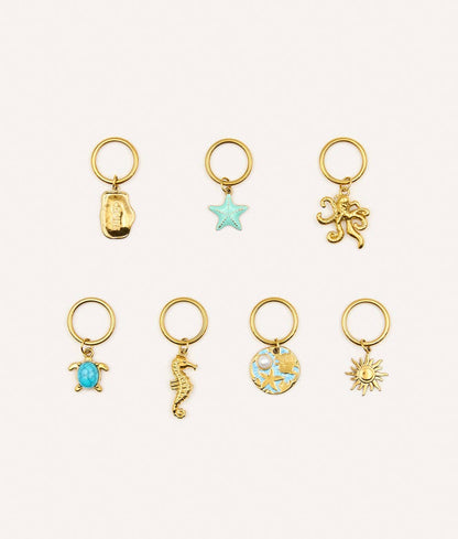 Pack de 7 breloques Perro Marino, Sira