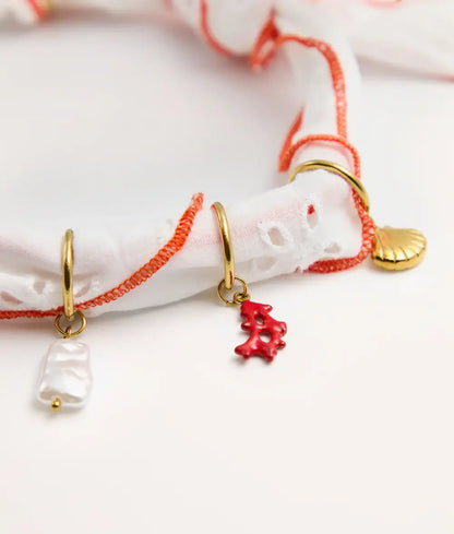 Pack de 7 charms Chien corail, Sira