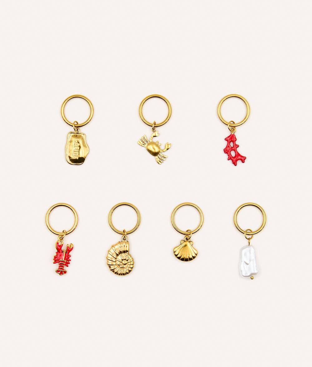Pack de 7 charms Chien corail, Sira